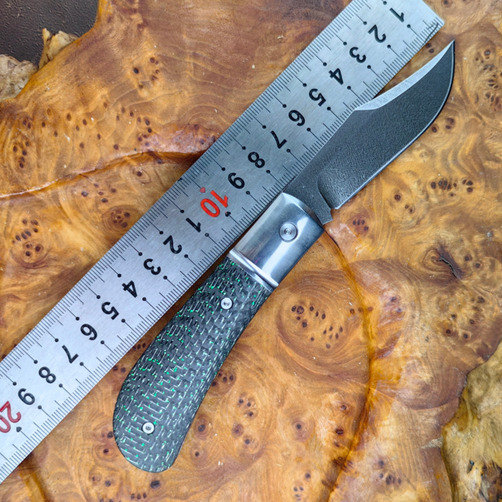 Pocket Knife in Wootz with Carbon Fiber