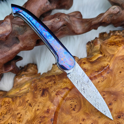Front Flipper Pocket Knife in Damasteel with Zircuti
