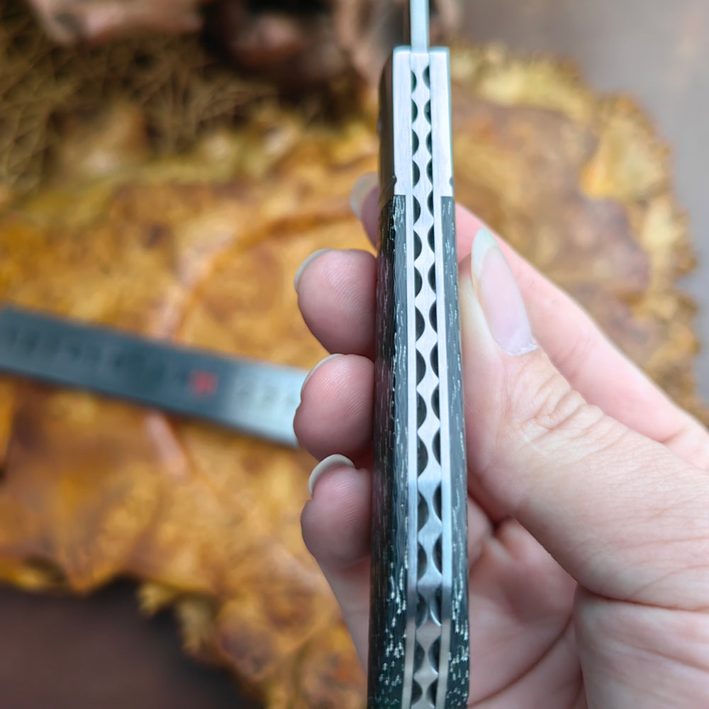 Pocket Knife in Wootz with Carbon Fiber